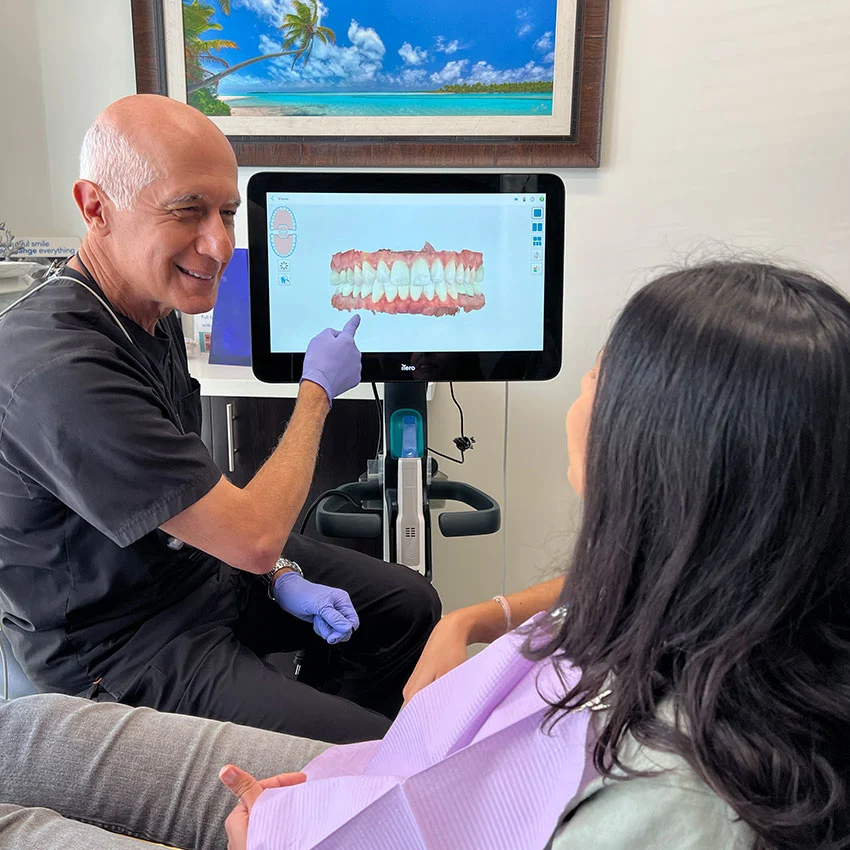 Dentist explaining patient her treatment plan in San Juan Capistrano, CA