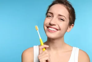 Patient taking care of her oral health in San Juan Capistrano, CA